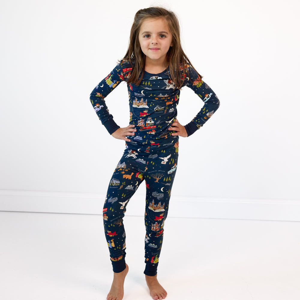 Child posing wearing An Evening at Hogwarts two piece pj set