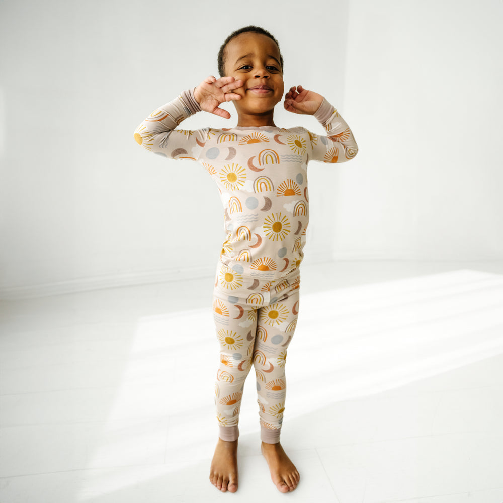 Click to see full screen - Alternate image of a child posing wearing Desert Sunrise two piece pajama set