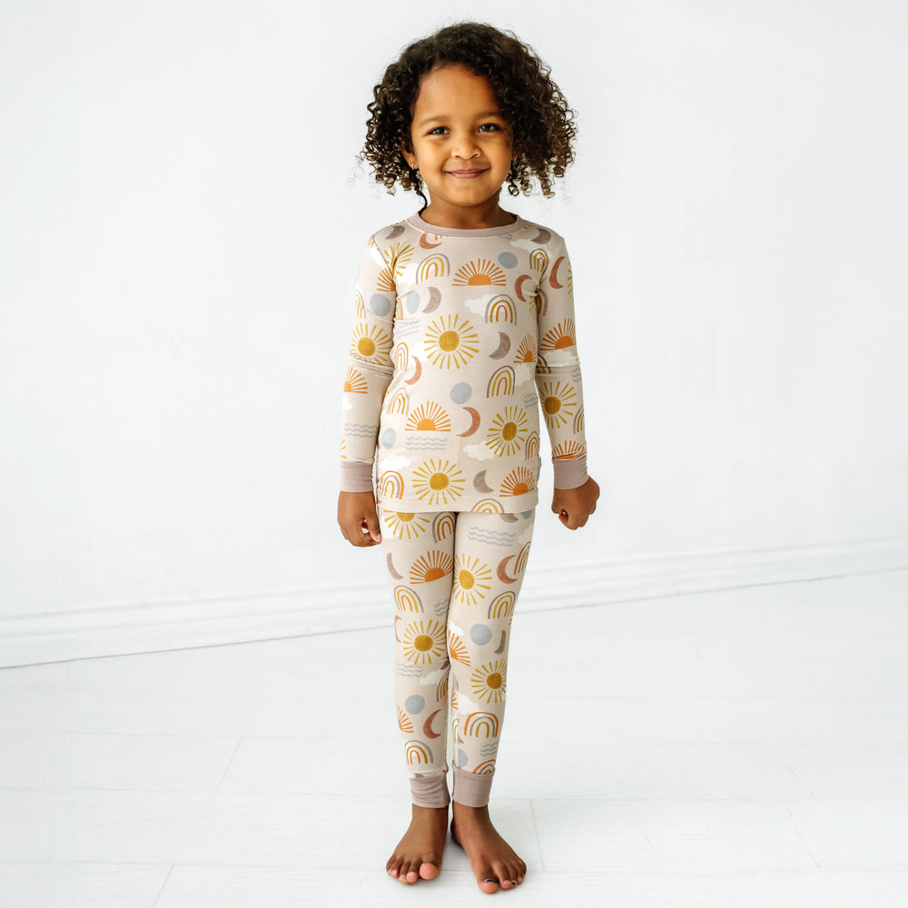 Child wearing Desert Sunrise two piece pajama set