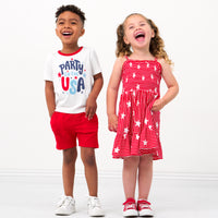 Two children wearing coordinating 4th of July Play outfits