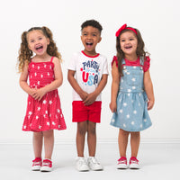 Three children wearing coordinating 4th of July Play outfits
