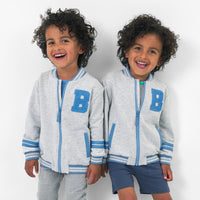 Two boys wearing the Bluey Gray Bomber Jacket