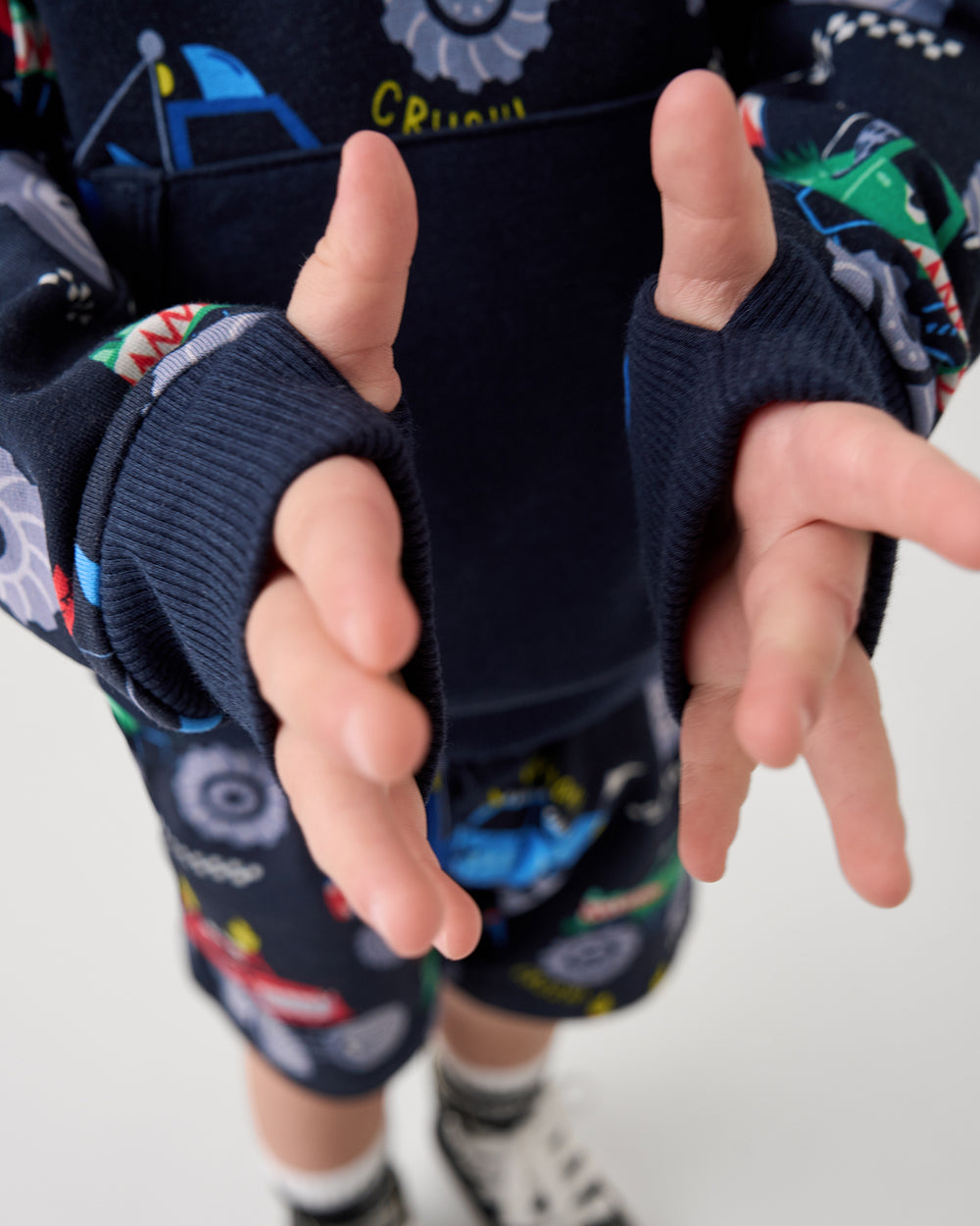 Close up of the thumb holes on the Monster Truck Madness Pullover Hoodie