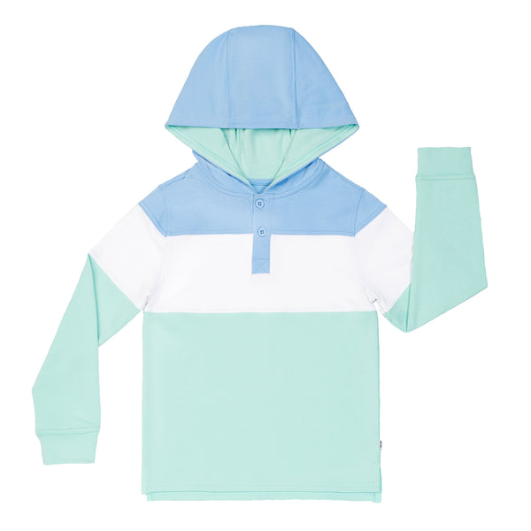 Flat lay image of an Ocean Waves pullover hoodie