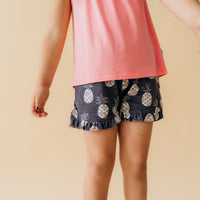 Alternate close up image of a child wearing Sweet Paradise ruffle shorts