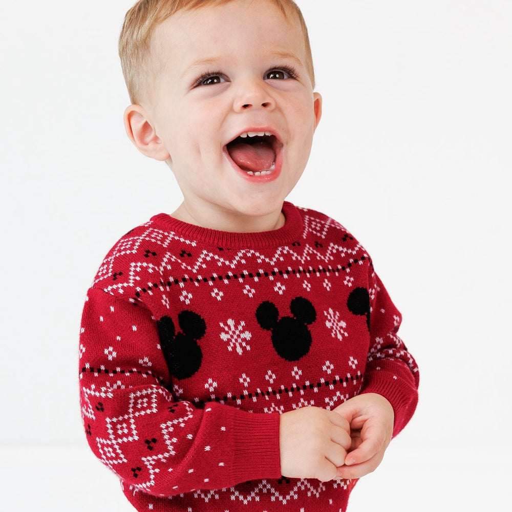 Close up image of a child wearing a Vintage Mickey Fair Isle Relaxed Sweater