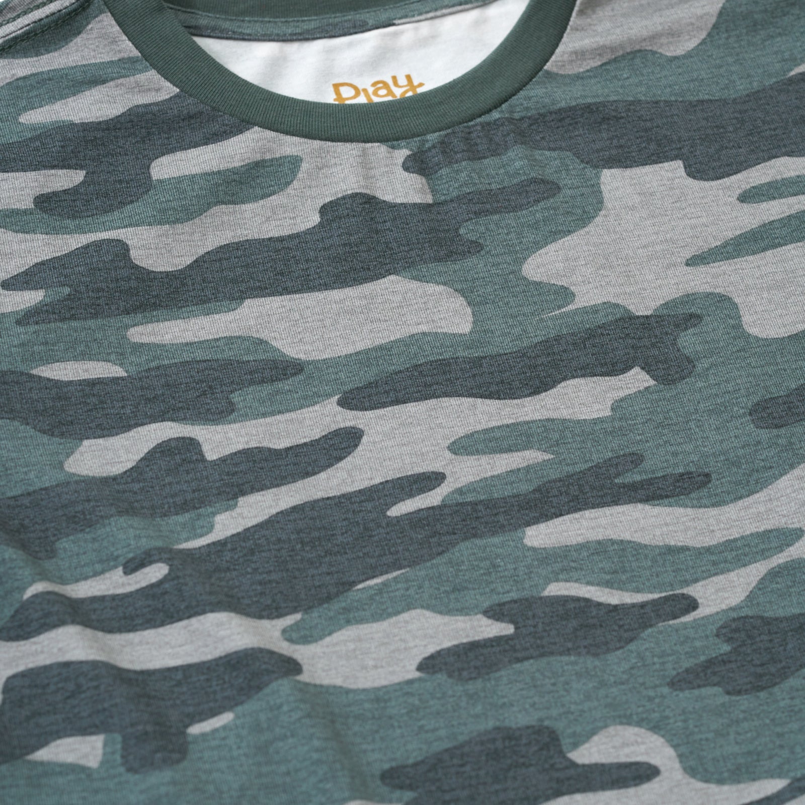 Close up image of the collar detail on the Vintage Camo Relaxed Tee