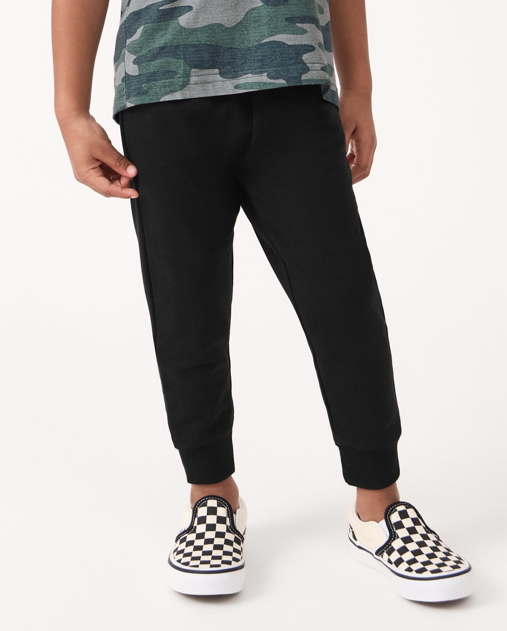 Front view of child wearing the Black Jogger