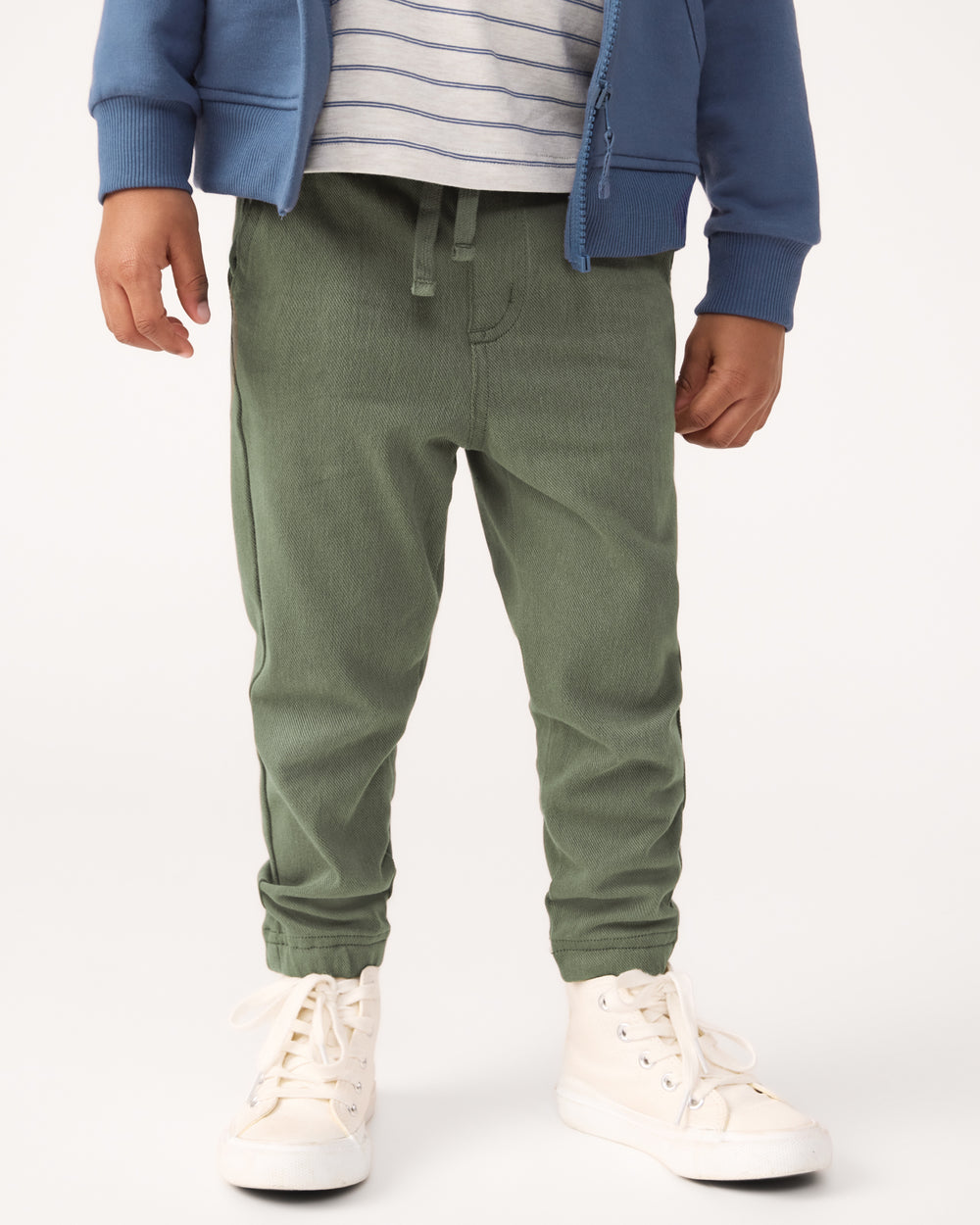 Close up of boy wearing the Olive Denim Jogger