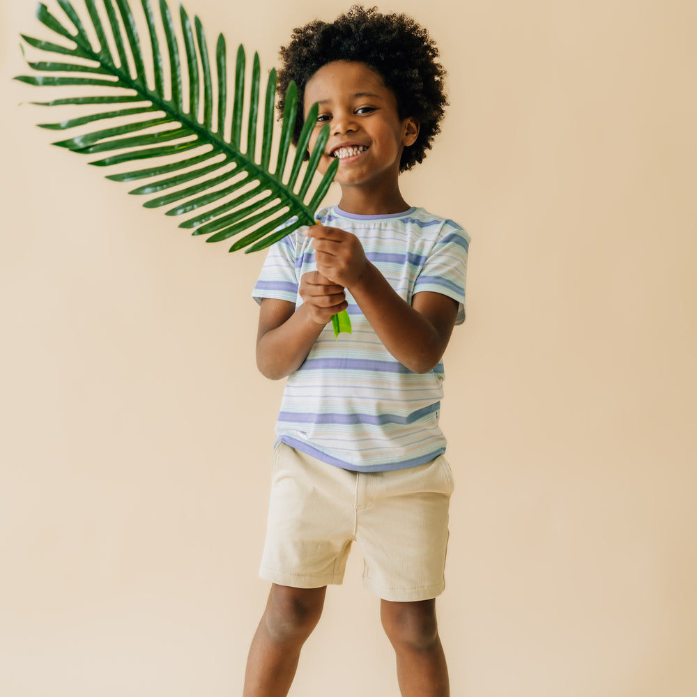 Child wearing a Surf Stripe relaxed tee paired with Kahki chinos