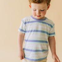 Close up image of a child wearing a Surf Stripe relaxed tee