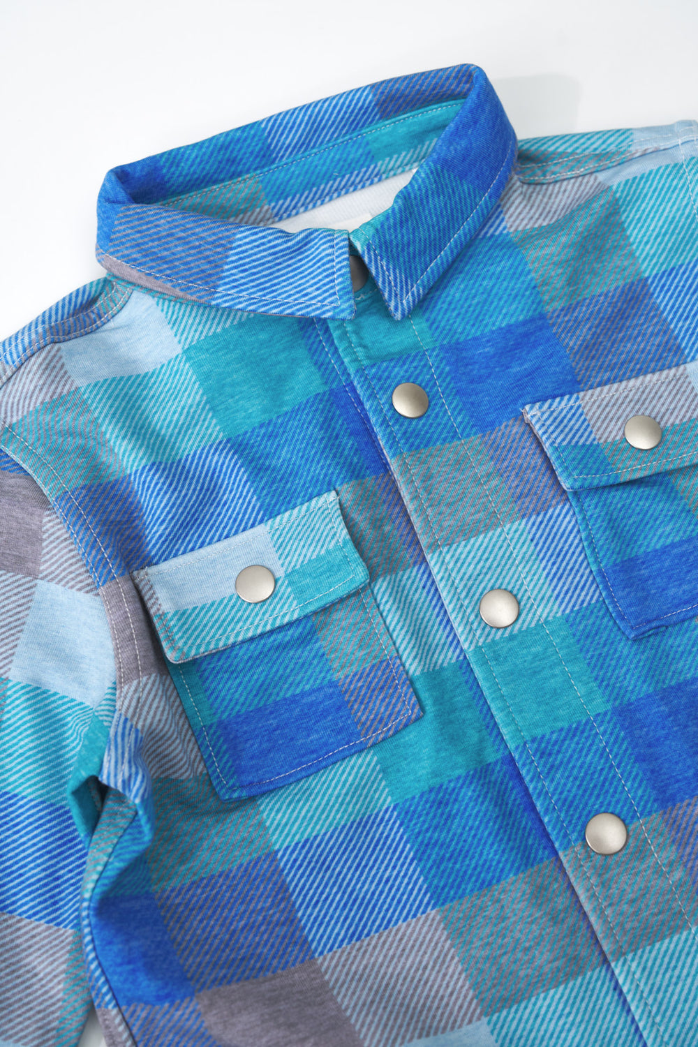 Alternate close up detail shot of the Arctic Plaid Shacket