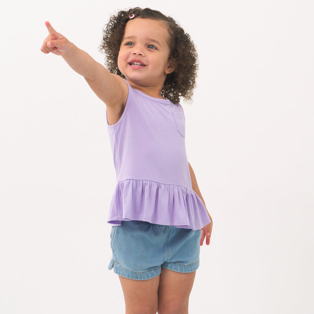 Alternate image of a child wearing a Pastel Lilac peplum pocket tank and coordinating Play shorts