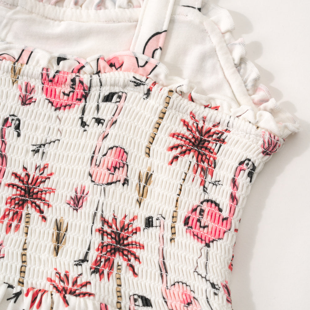 Close up flat lay of the smocking on a Pink Palms tank smocked dress