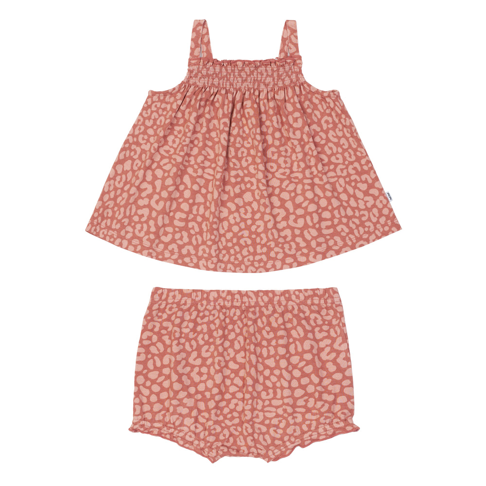 Flat lay image of a Desert Leopard smocked top with shorty bloomer