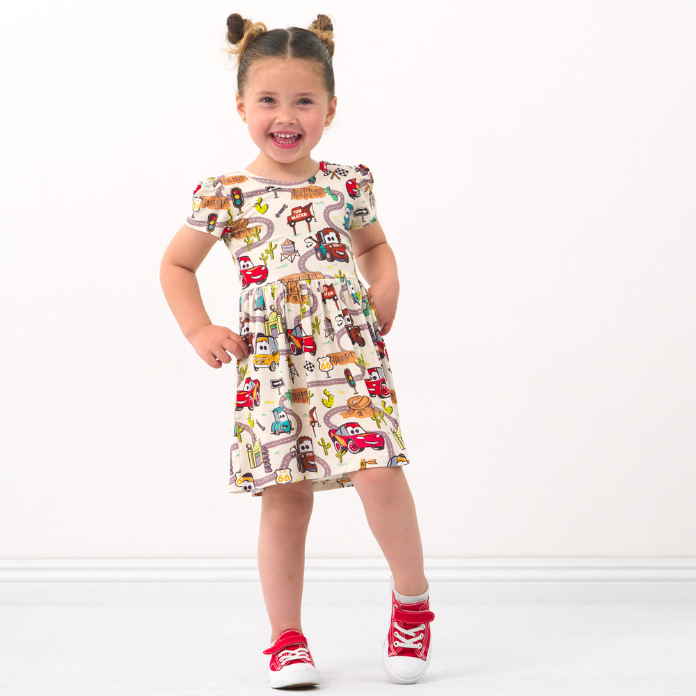 Child wearing a Radiator Springs skater dress