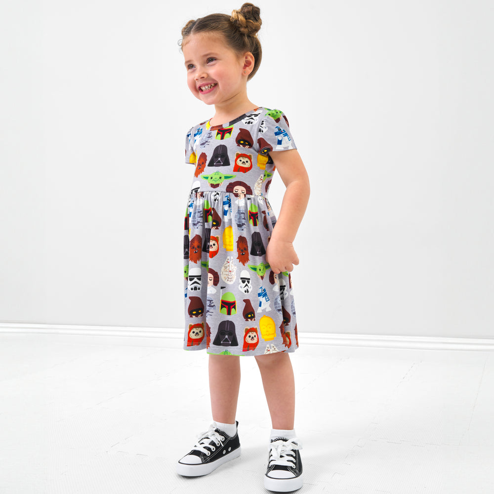 Child wearing a Legends of the Galaxy skater dress