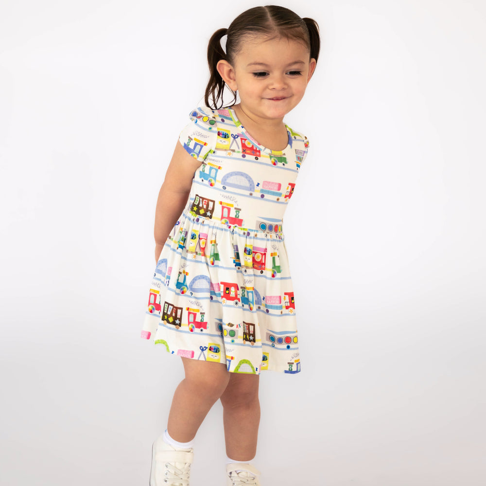 Alternate image of girl standing while wearing the Education Express Skater Dress with Bodysuit