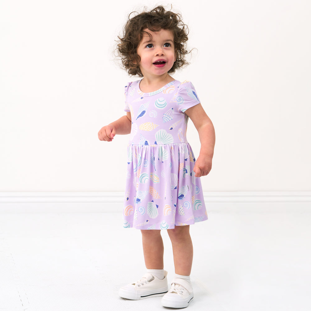 child wearing a Sandy Treasures skater dress with bodysuit