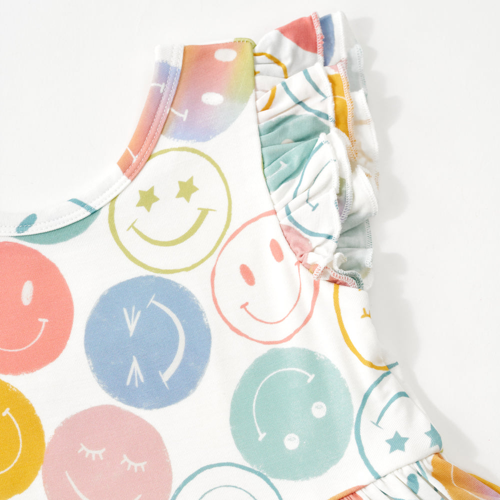 Close up flat lay image of the shoulder detail on the Positive Vibes Flutter Twirl Dress