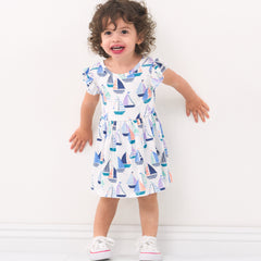 Child wearing Seas the Day flutter skater dress with bodysuit