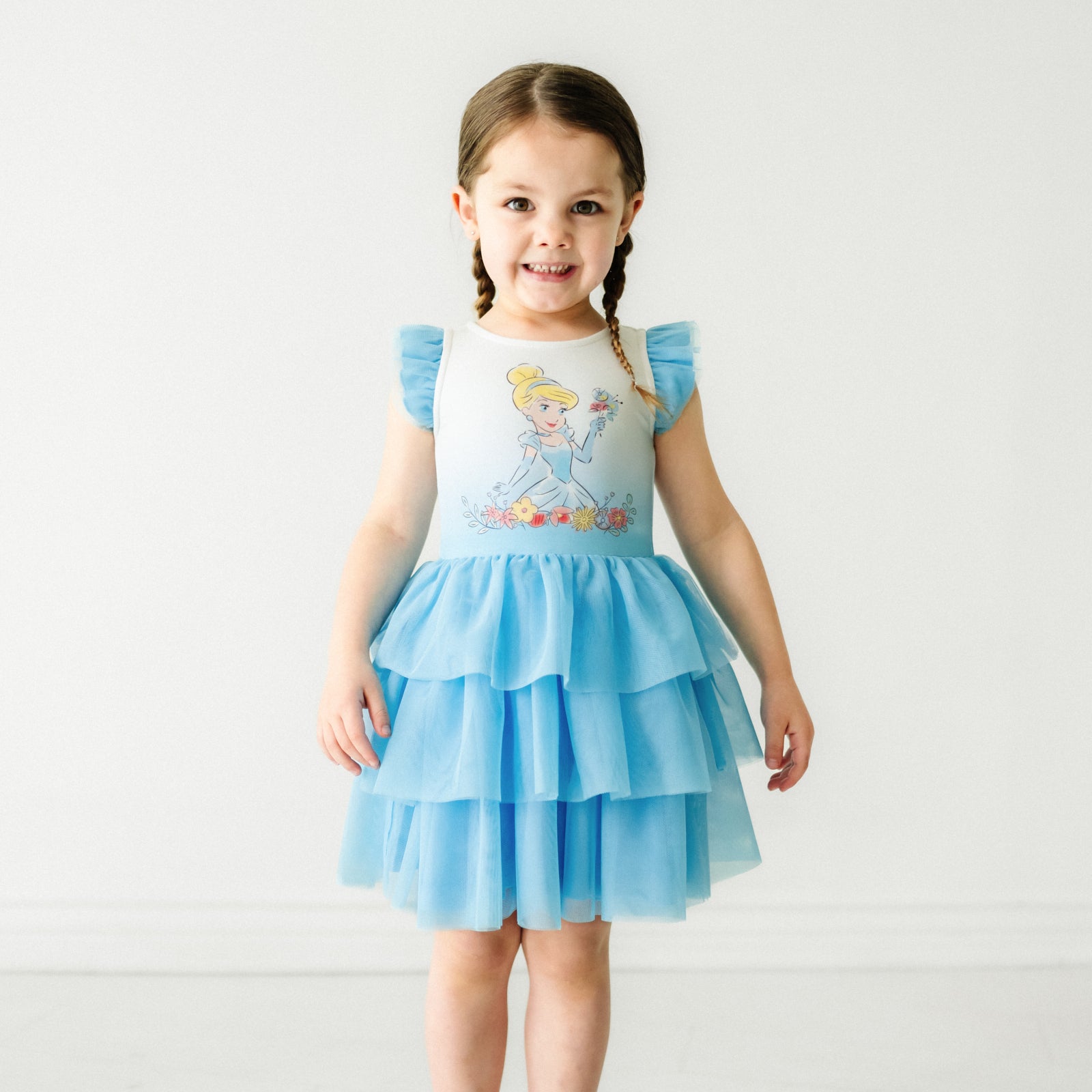 Child wearing a Cinderella flutter tiered tutu dress
