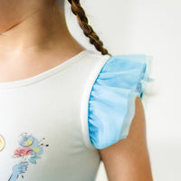 Close up image of a child wearing a Cinderella flutter tiered tutu dress, detailing the flutter sleeve