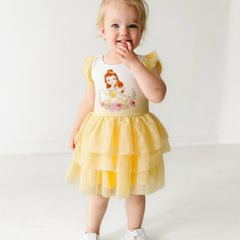 Child wearing a Belle flutter tiered tutu dress with bloomer