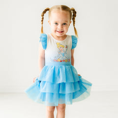 Child wearing a Cinderella flutter tiered tutu dress with bloomer