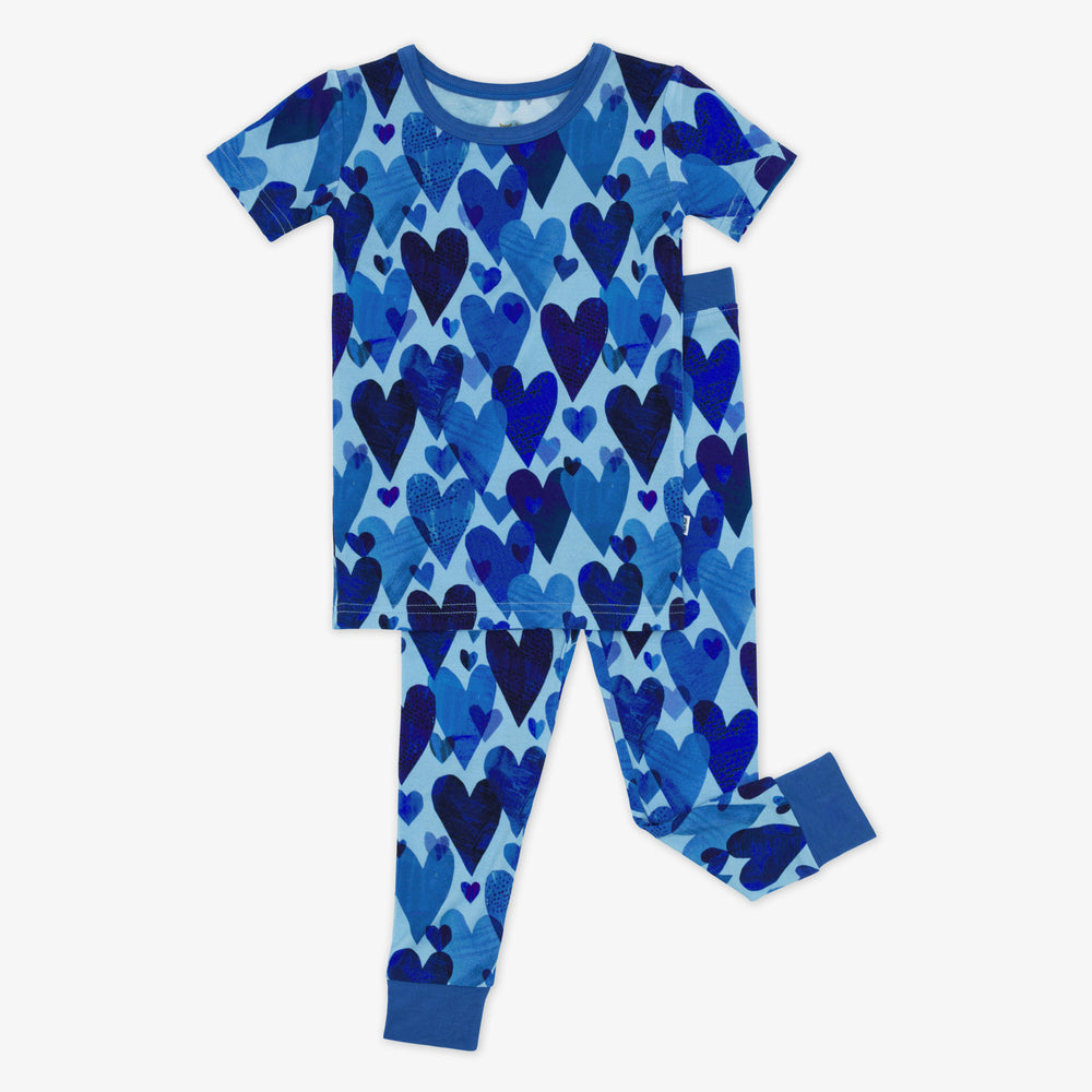 Flat lay of Blue Hearts & Crafts short sleeve and pants pajama set.