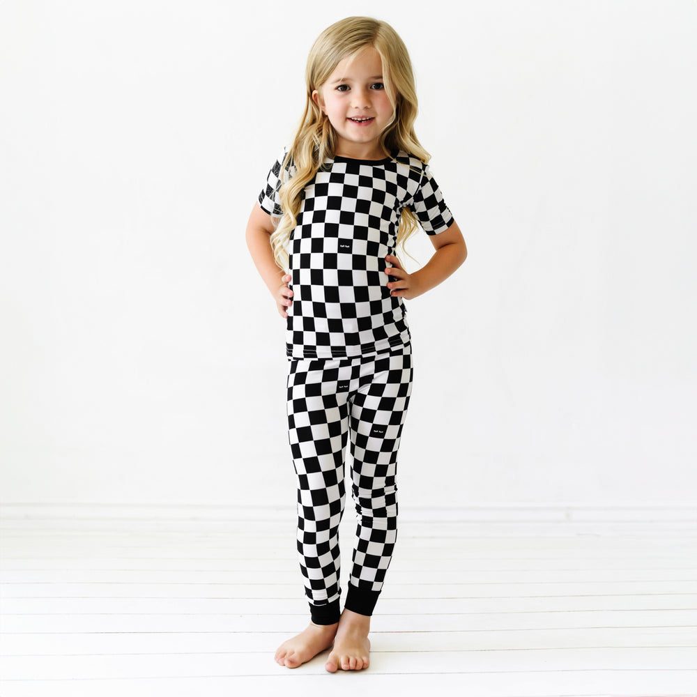 Child posing wearing Cool Checks short sleeve pj set