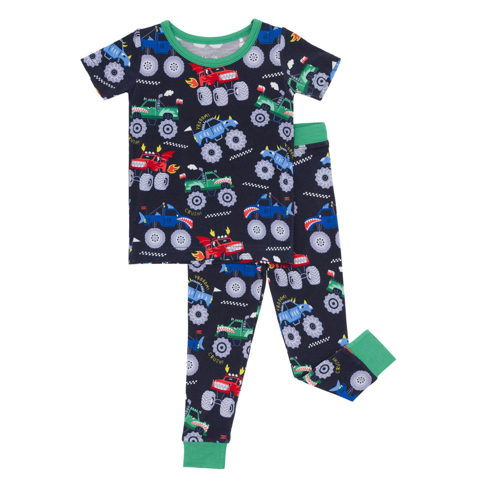 Flat lay image of the Monster Truck Madness Two-Piece Short Sleeve Pajama Set