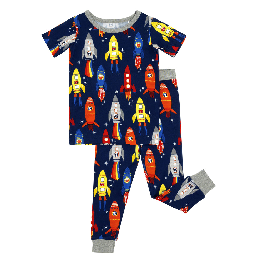 Flat lay image of a Navy Space Explorer two piece short sleeve pajama set