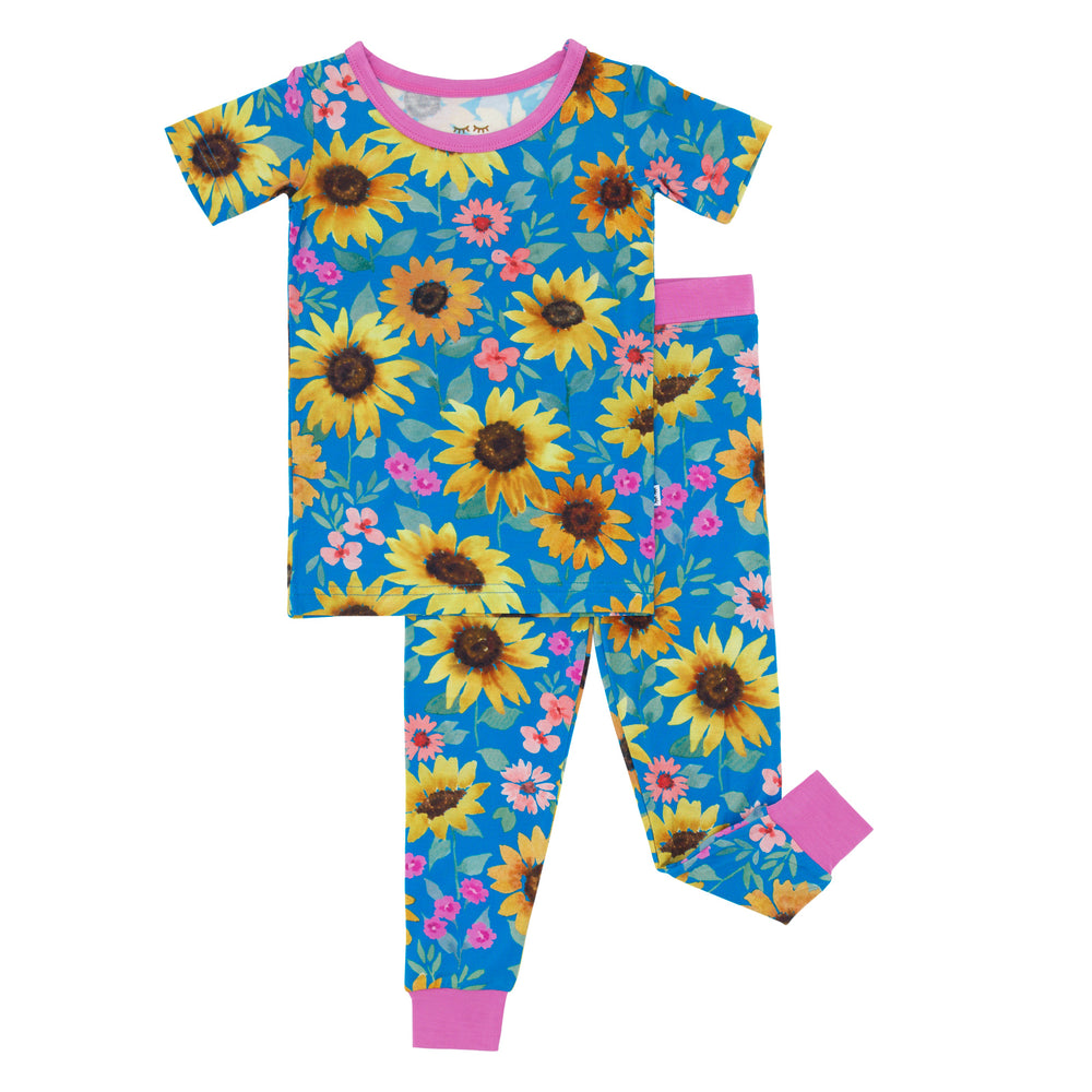 Flat lay image of the Sunflower Fields Two-Piece Short Sleeve Pajama Set 