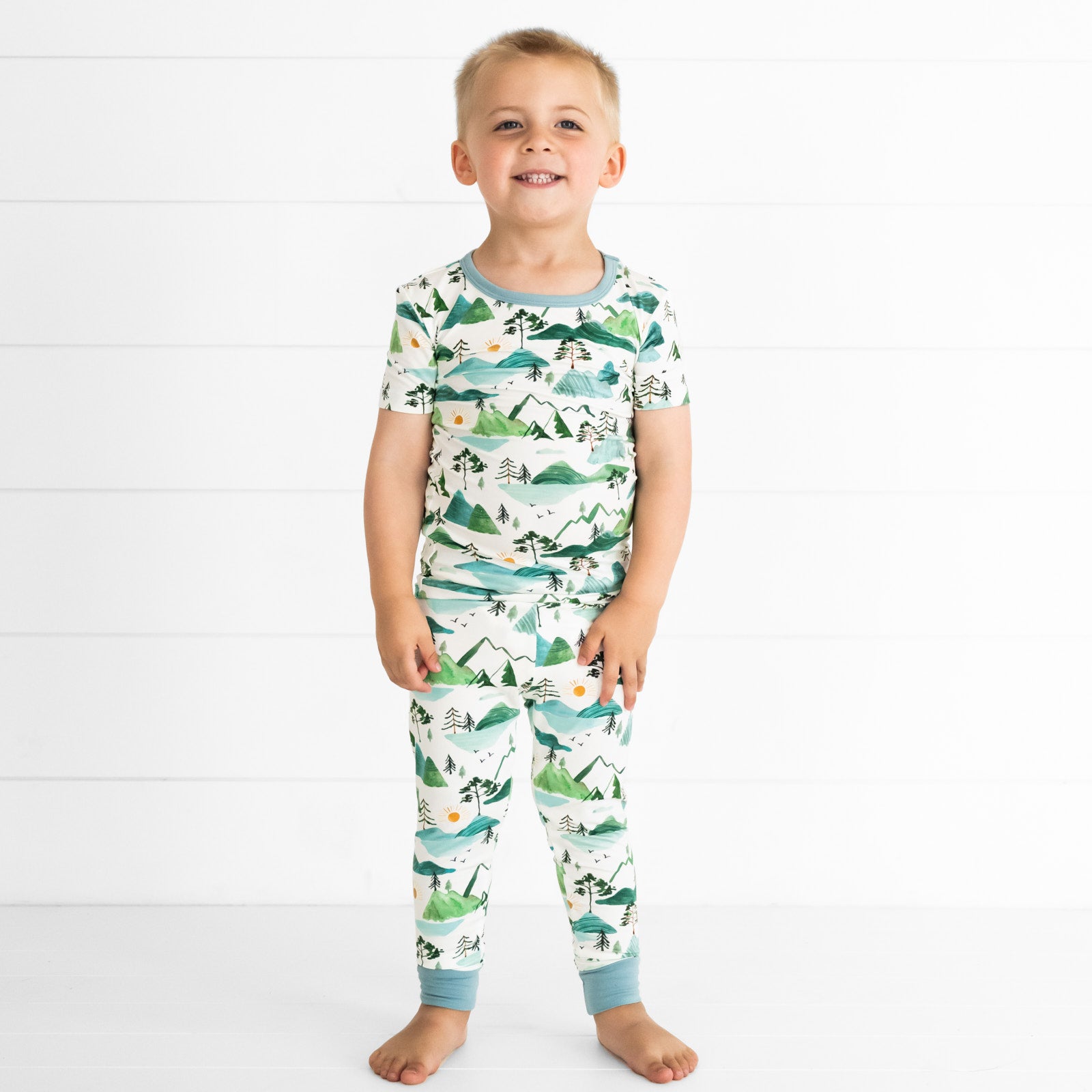 child wearing a Mountain Mist two piece short sleeve pajama set