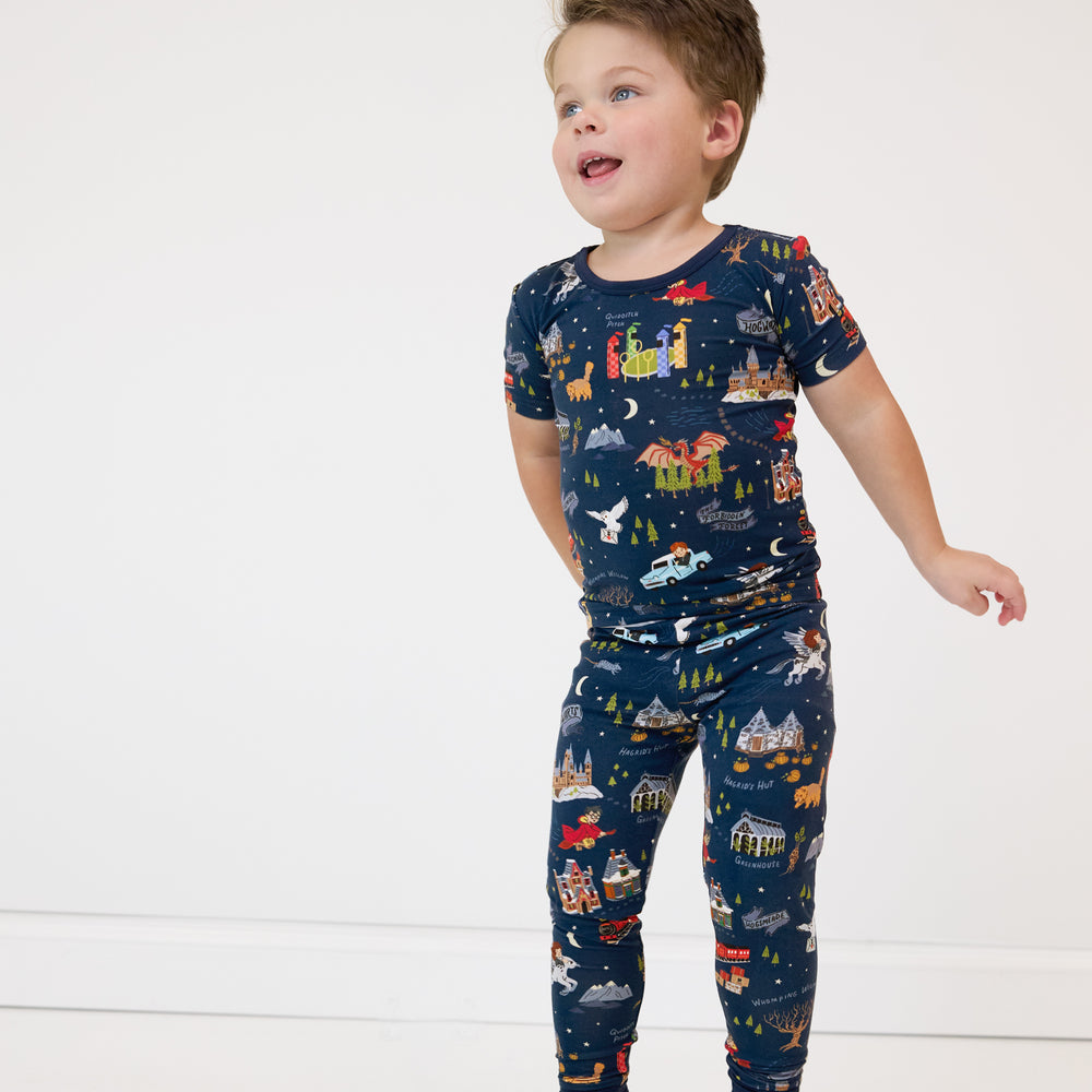 image of a child posing wearing An Evening at Hogwarts two piece short sleeve pj set