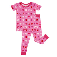 Flat lay image of Pink XOXO short sleeve pajama set
