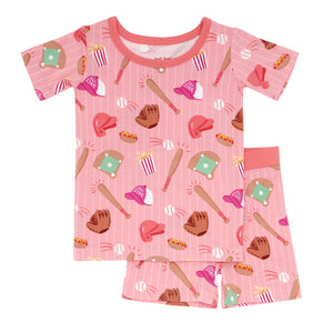 Flat lay image of a Pink All Stars two piece short sleeve and shorts pajama set