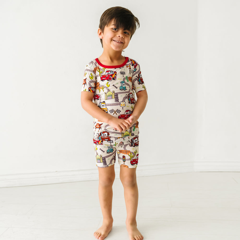 Child wearing a Radiator Springs two piece short sleeve and shorts pajama set