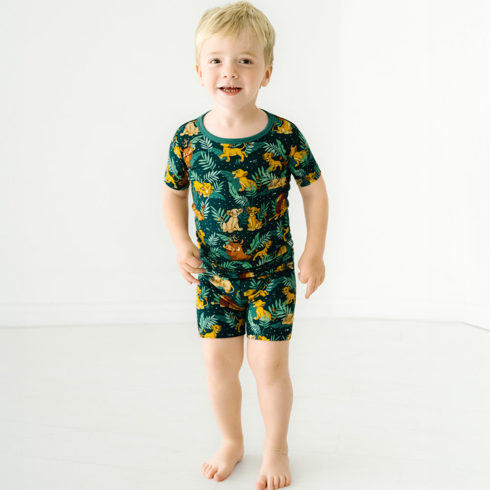 Child wearing Disney Simba's Sky two piece short sleeve and shorts pajama set