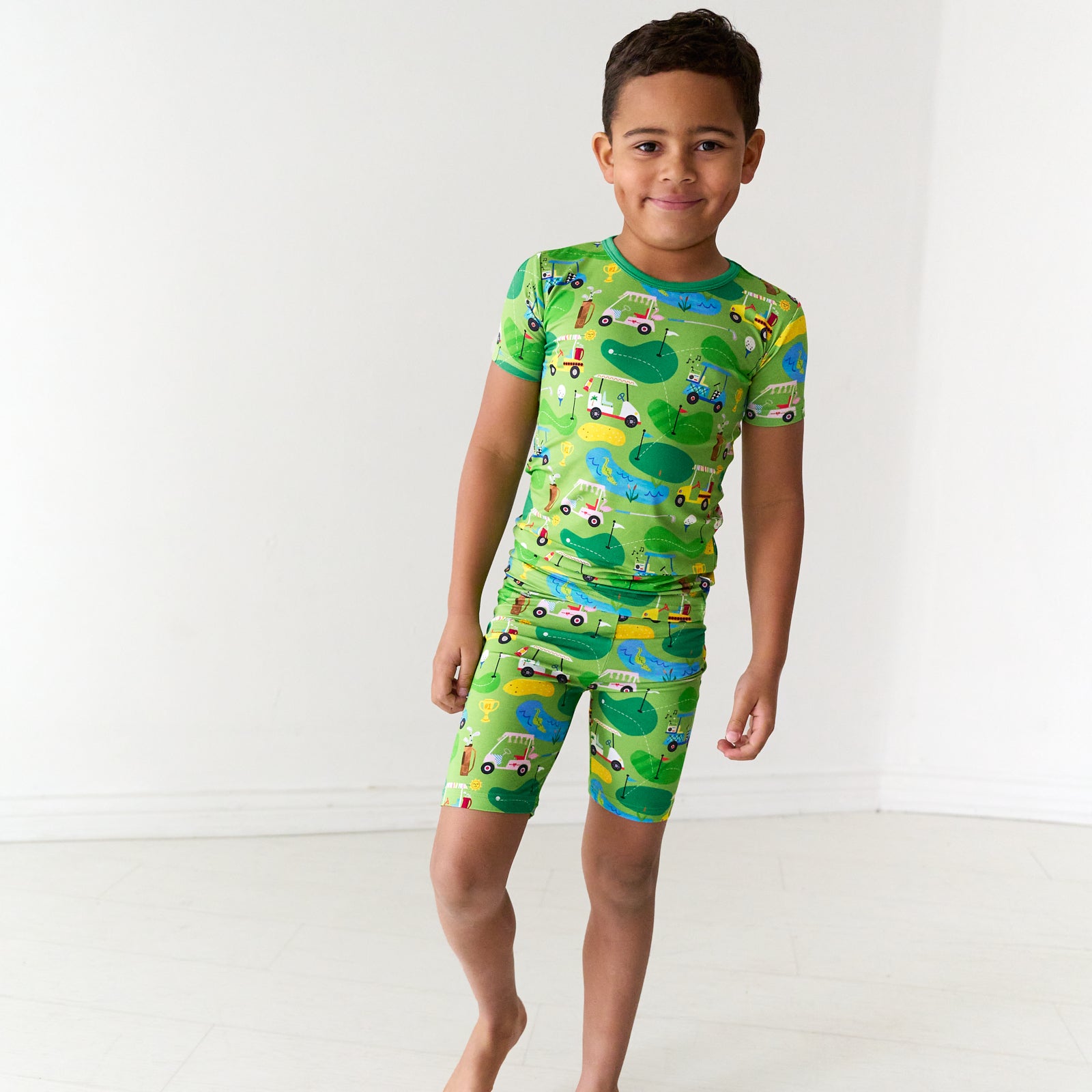 Alternate image of a child wearing a Fairway Fun two-piece short sleeve and shorts pajama set
