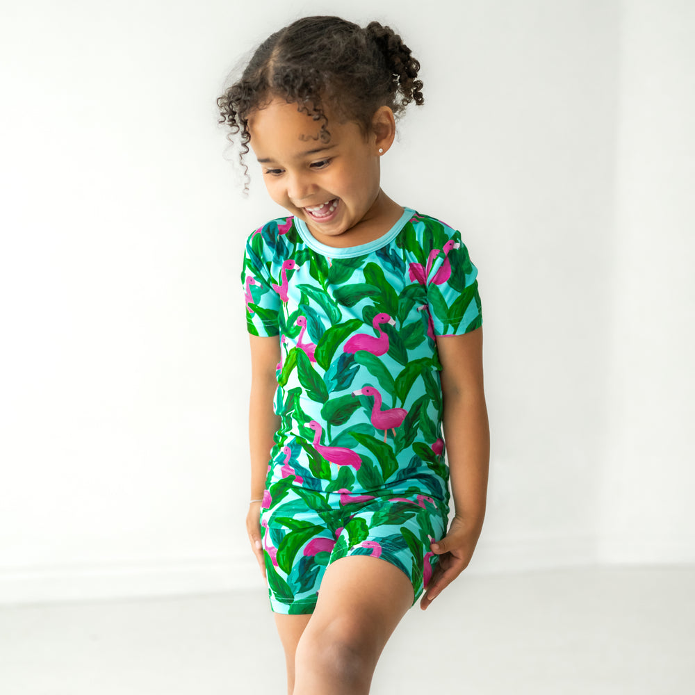 Alternate image of a child posing wearing a Palm Springs two piece shorts and short sleeve pajama set