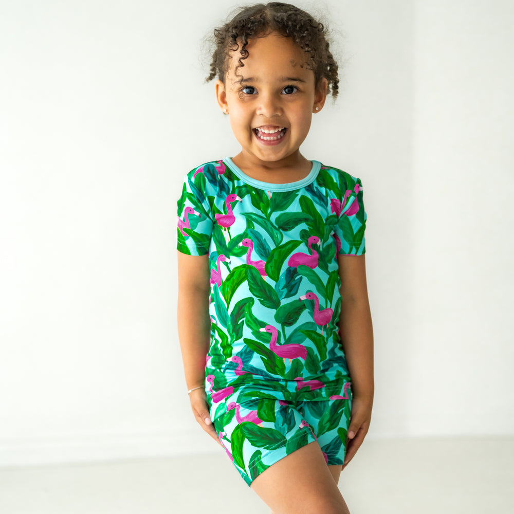 Child posing wearing a Palm Springs two piece shorts and short sleeve pajama set