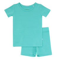 Flat lay image of a Glacier Turquoise short sleeve and shorts pajama set