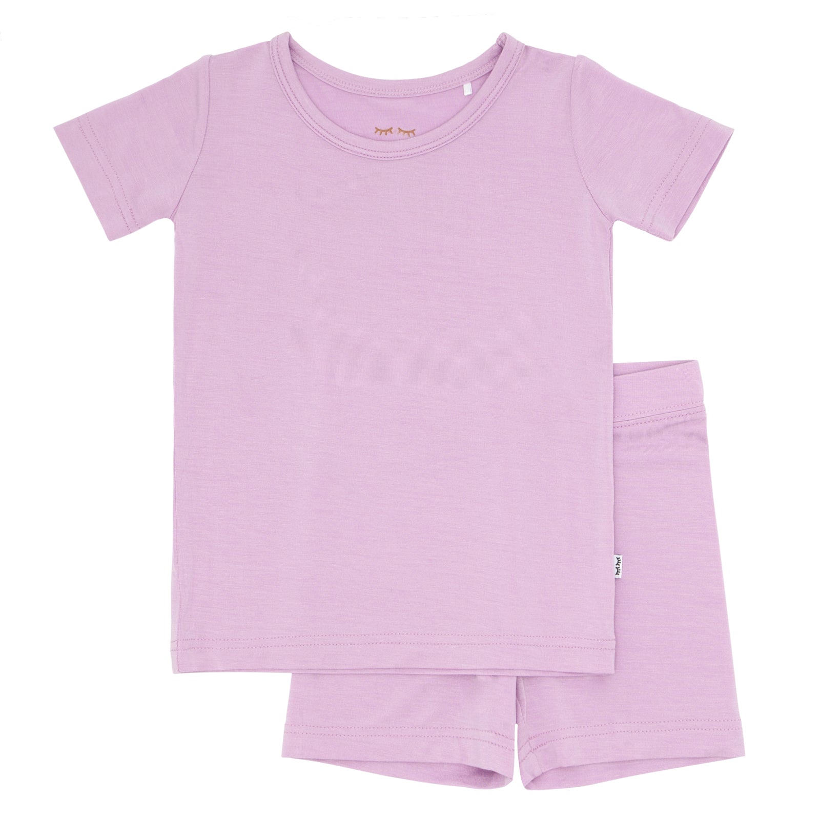 Flat lay image of a Light Orchid two piece shorts and short sleeve pajama set