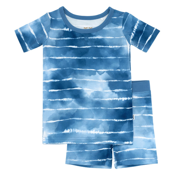 Flat lay image of a Blue Tie Dye Dreams two-piece short sleeve & shorts pajama set