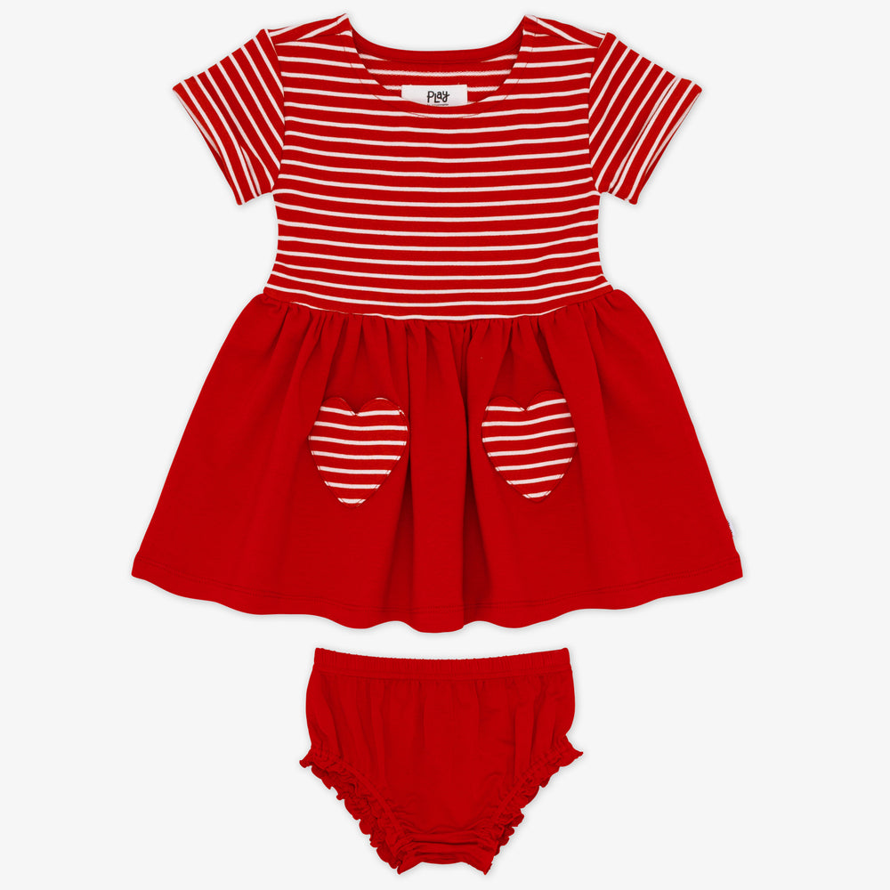 Flat lay of a Candy Red Patch Pocket Dress with Bloomer, featuring short sleeves, a red & white striped top & heart pockets and red skirt and bloomer