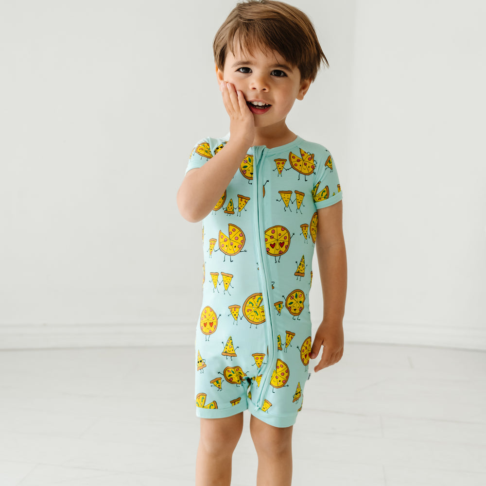 Child posing wearing a Pizza Pals shorty zippy