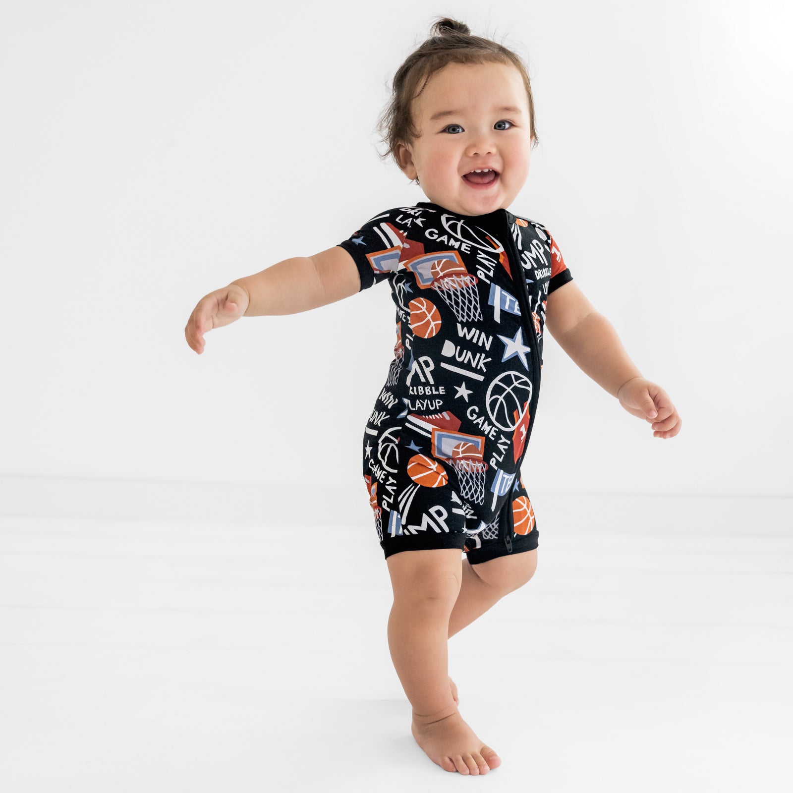 Dancing child wearing the Black Slam Dunk short zippy