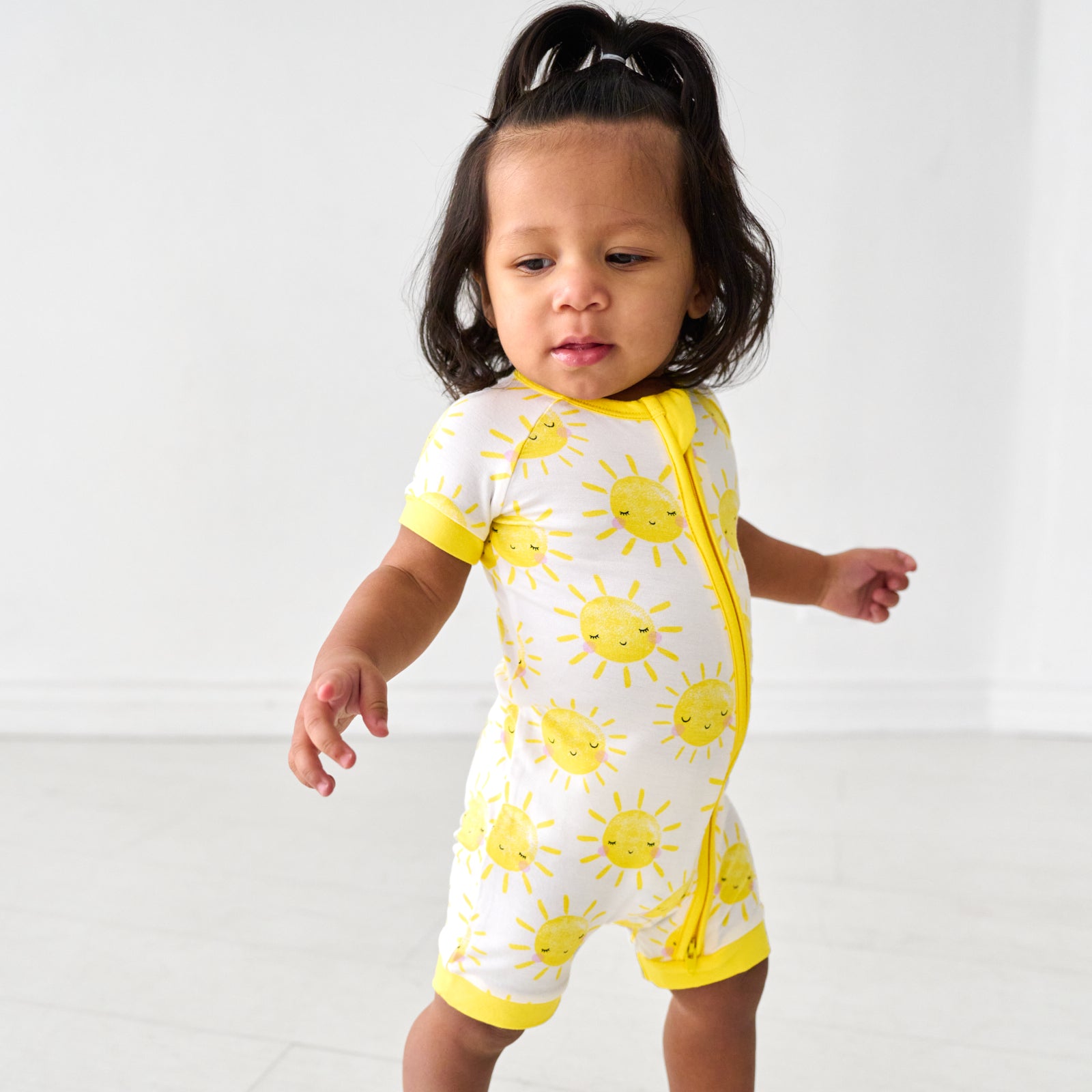 Child wearing a Sunshine Shorty Zippy